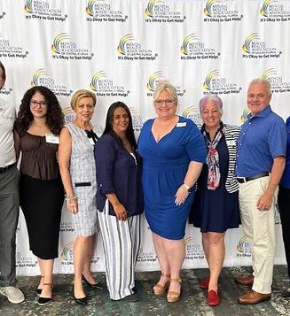 Gary-Izabella-MaryAnne-Nancy-Jill-Della-Jon-and-Shannon-at-the-MHACF-Luncheon-570x421.jpg